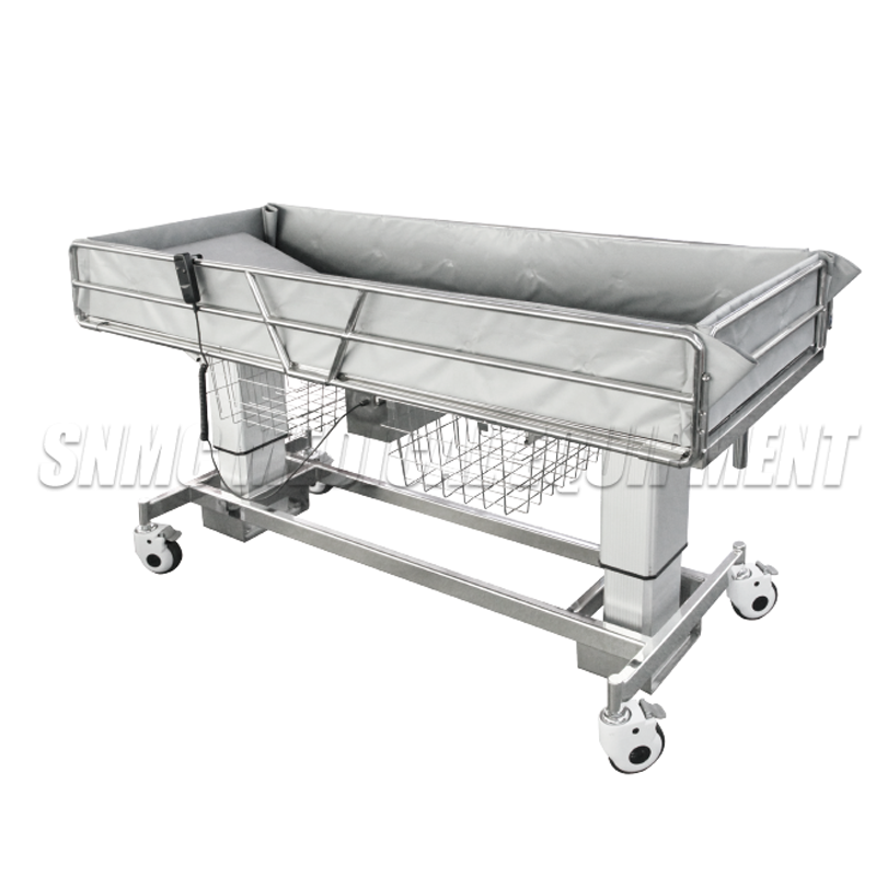 Electric shower bed in hospital ward