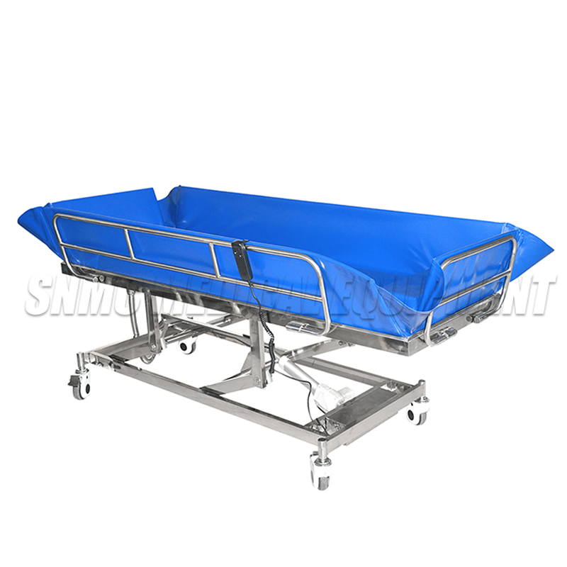 Electric shower bed in hospital ward